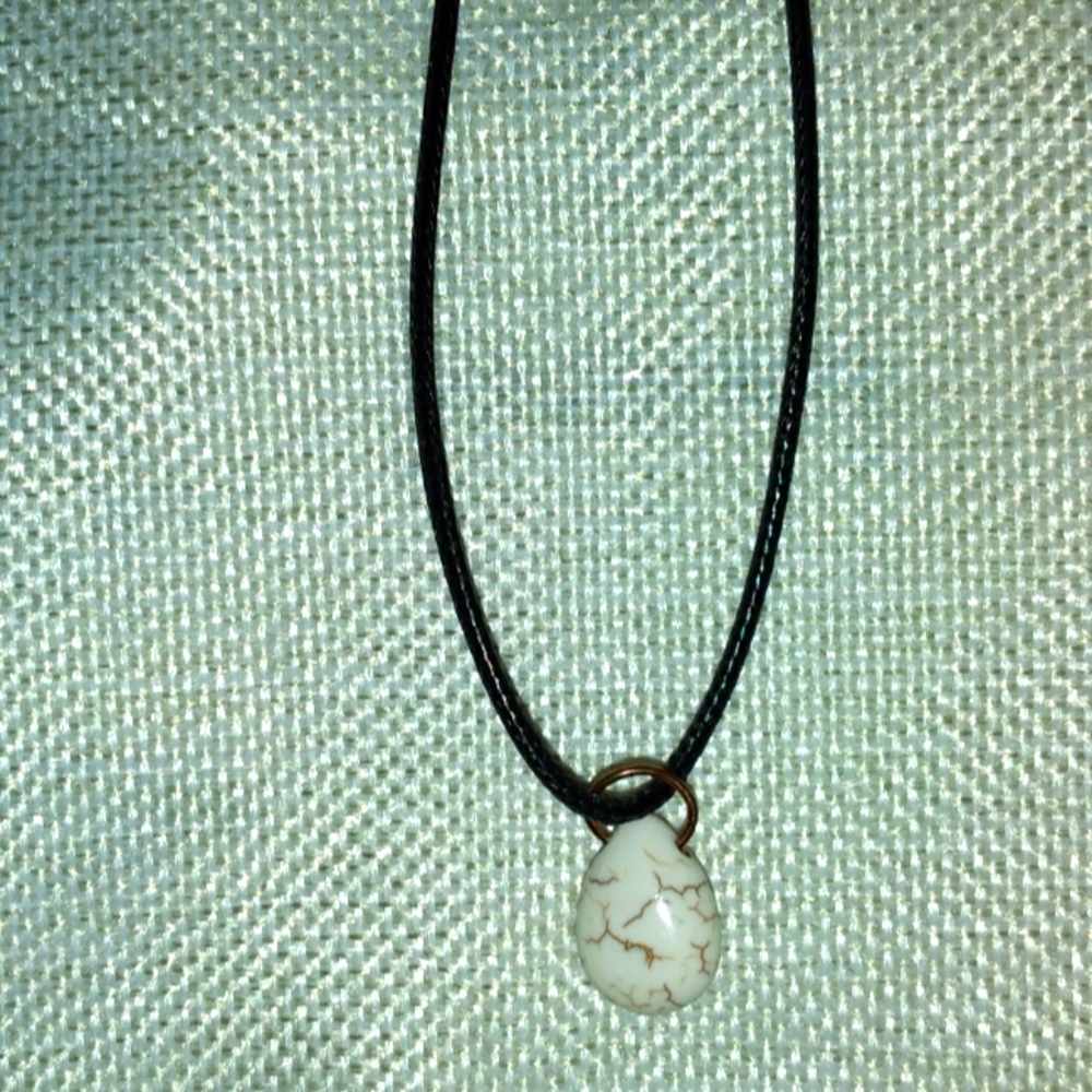 Pretty white moon necklace.